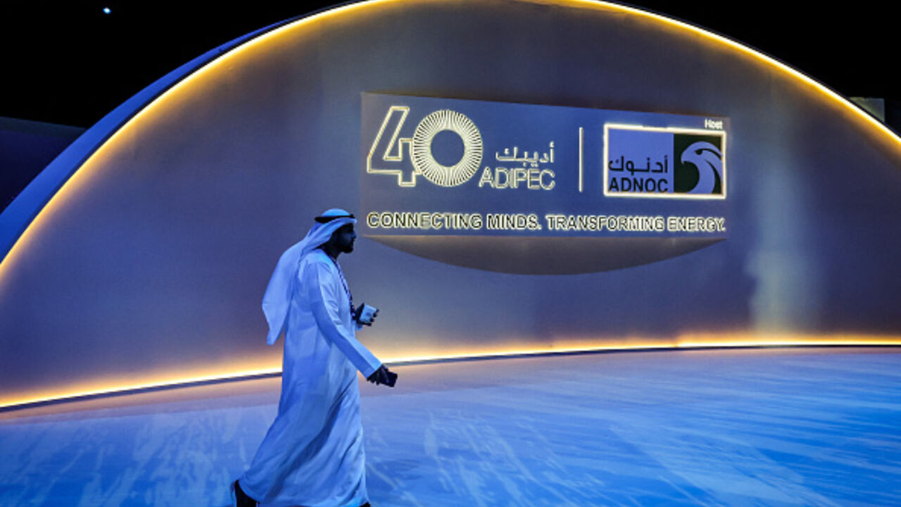 A man walks at the Abu Dhabi International Petroleum Exhibition & Conference (ADIPEC) in Abu Dhabi on November 4, 2024. (FADEL SENNA/AFP via Getty Images)