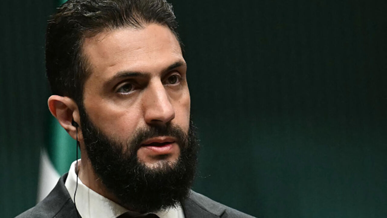 Syria's interim president Ahmed al-Sharaa holds a joint press conference with the Turkish president following their meeting at the Presidential Palace in Ankara, on February 4, 2025. Syria's interim president is in Turkey for talks with the country's leader after flying in from Saudi Arabia, where he was seeking help from wealthy Gulf countries to finance the reconstruction of his war-ravaged nation and revive its economy, as part of his second international trip since ousting the former Syrian president. (