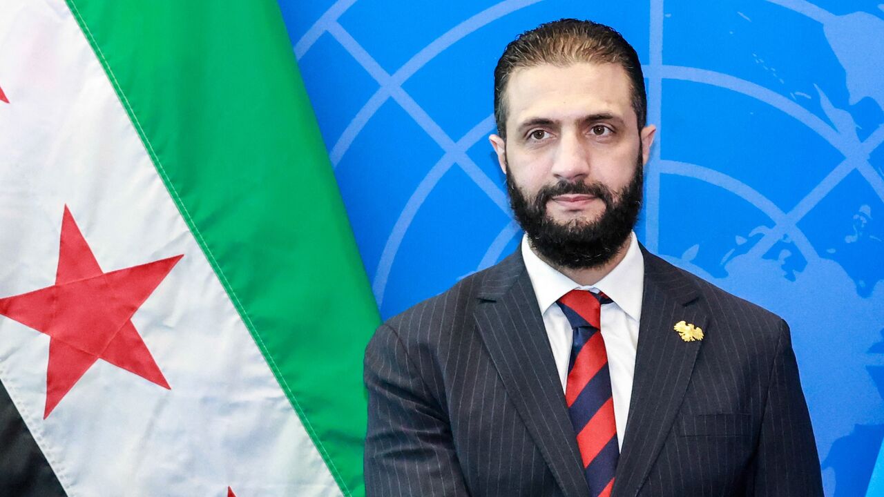 Syrian President Ahmed al-Sharaa visits with UN Secretary-General Antonio Guterres (off frame) during the United Nations General Assembly at the UN headquarters in New York City on Sept. 24, 2025.