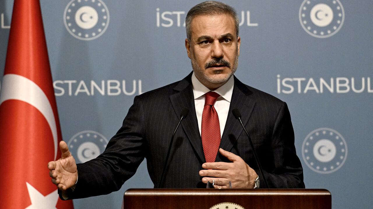 Turkish Foreign Minister Hakan Fidan gestures as he speaks during a press conference after a meeting with his counterparts from Saudi Arabia, Qatar, the United Arab Emirates, Jordan, Pakistan and Indonesia in Istanbul on November 3, 2025. Turkey on November 3, 2025, hosts a string of top diplomats from the Islamic world to bring their influence to bear on the future of Gaza, as fears grow for the increasingly fragile truce. The October 10 ceasefire in the two-year-long Israel-Hamas war, brokered by US Presi