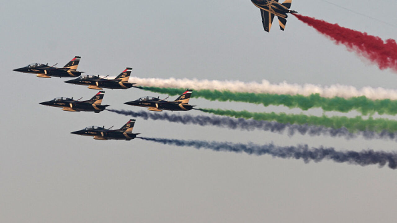Fursan Al Emarat, the aerobatic team of the United Arab Emirates Air Force and Air Defence, perform during the 2025 Dubai Airshow at Al-Maktoum International Airport in Dubai on November 21, 2025. (FADEL SENNA/AFP via Getty Images)