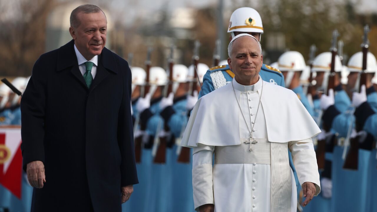 President of Turkey Recep Tayyip Erdogan greets Pope Leo XIV during a welcome ceremony at the Presidential Palace, Ankara, Nov. 27, 2025.