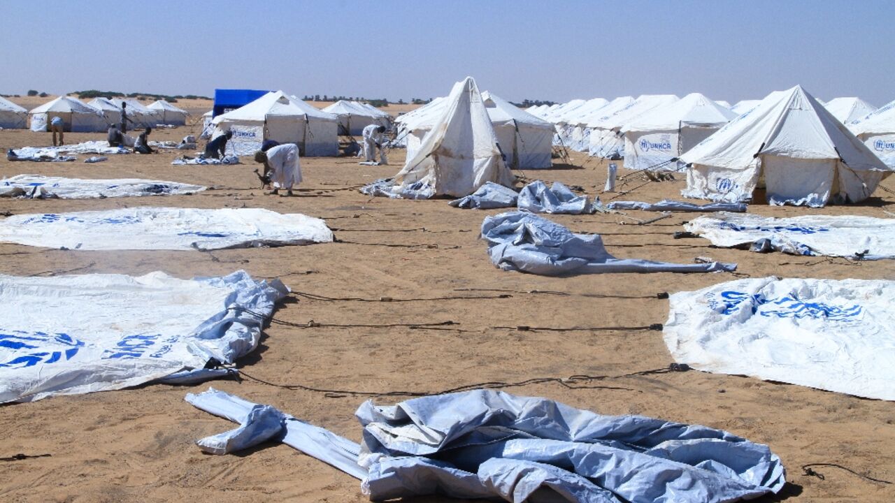 Exhausted health workers have been treating patients in makeshift tents at Al-Dabbah camp in Sudan after fleeing El-Fasher