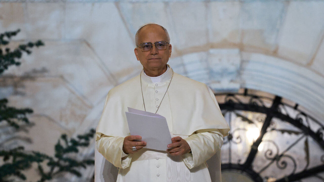 Pope Leo XIV meets young people at a square outside the Maronite Patriarchate of Antioch, during his first apostolic journey, in Bkerke, Lebanon December 1, 2025. REUTERS/Yara Nardi
