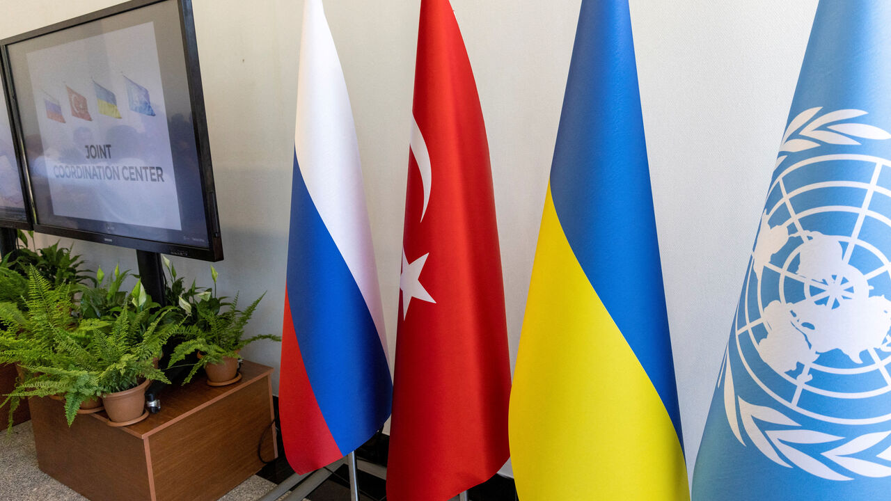 FILE PHOTO: National flags of Russia, Ukraine, Turkey and a U.N. flag are seen during the opening ceremony of a joint coordination centre (JCC) that will oversee a U.N.-brokered deal to re-open Ukrainian grain exports in the Black Sea, in Istanbul, Turkey, July 27, 2022. REUTERS/Umit Bektas/File Photo