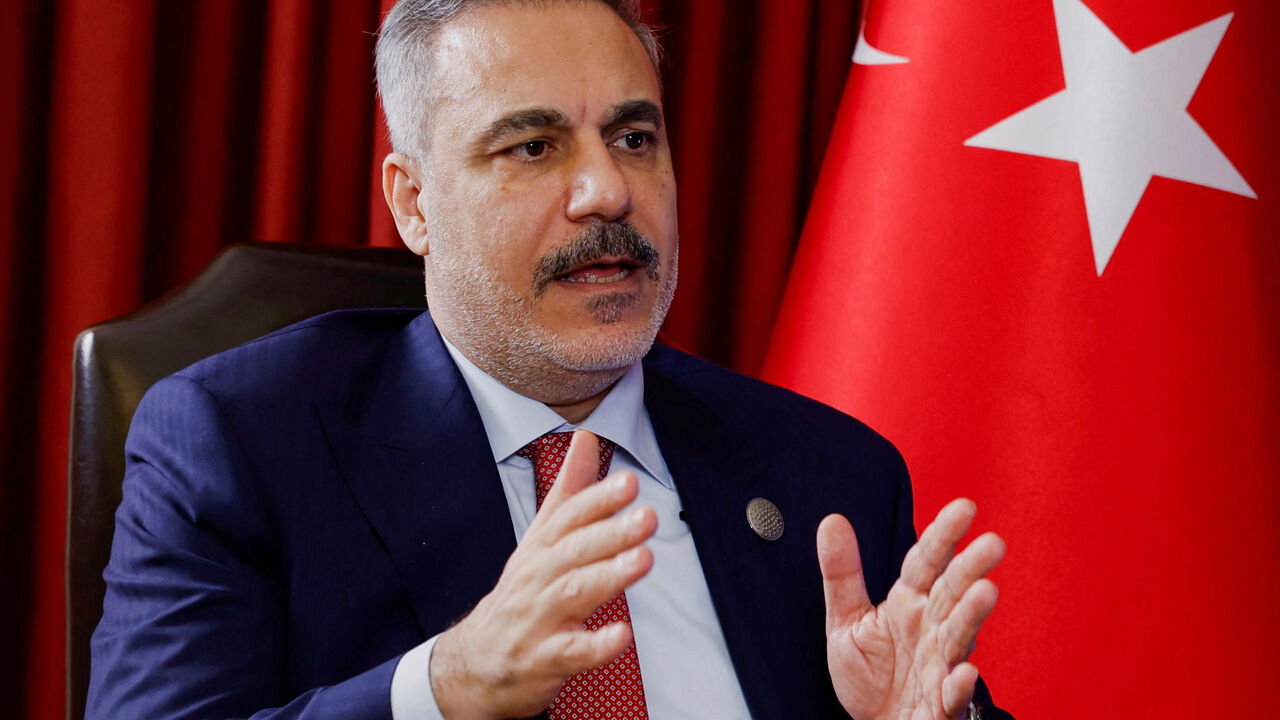 Turkish Foreign Minister Hakan Fidan speaks during an interview with Reuters at the 23rd edition of the annual Doha Forum, in Doha, Qatar, December 6, 2025. REUTERS/Ibraheem Abu Mustafa