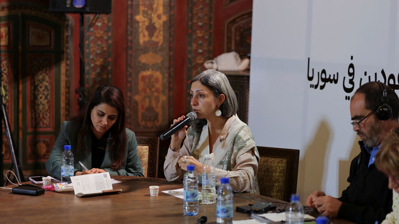 Media advisor for the Syrian National Commission for the Missing, Zeina Shahla, speaks during press conference, in Damascus, Syria, November 28, 2025. REUTERS/Khalil Ashawi