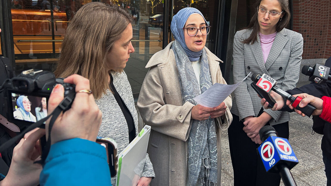 Rumeysa Ozturk, a Tufts University student from Turkey, speaks to reporters after urging a federal judge to order the Trump administration to restore her student visa record, outside the federal court in Boston, Massachusetts, U.S., December 4, 2025. REUTERS/Nate Raymond