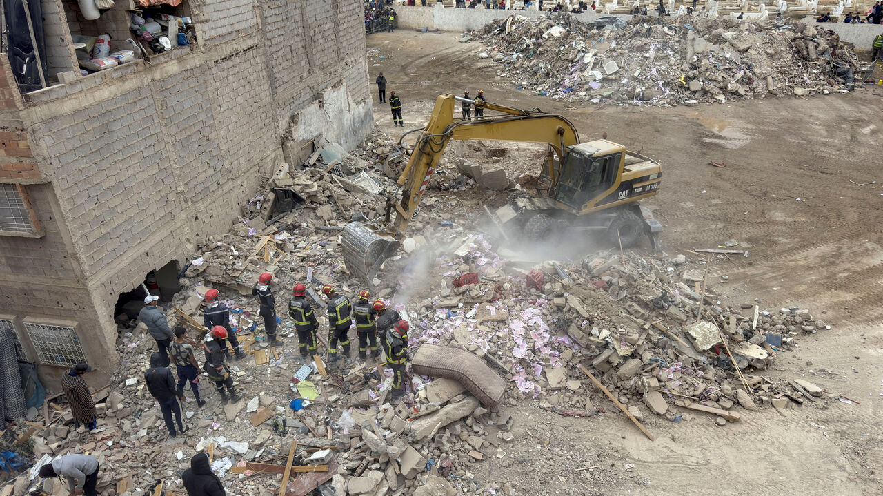 Rescuers work at the site of the collapse of two buildings in Fes, Morocco, December 10, 2025. REUTERS/Said Echarif