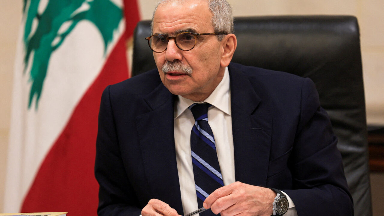 FILE PHOTO: Lebanese Prime Minister Nawaf Salam speaks to journalists at the government headquarters in Beirut, Lebanon, December 3, 2025. REUTERS/Mohamed Azakir/File Photo