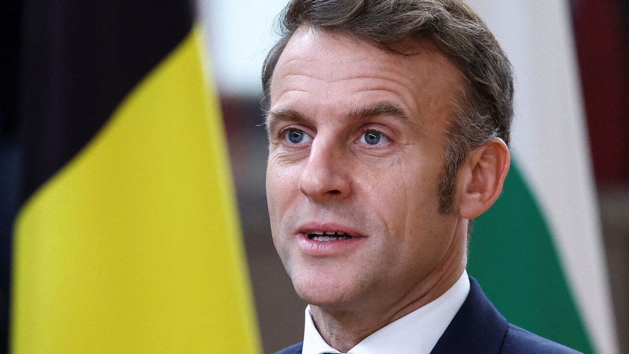 France's President Emmanuel Macron speaks to the media as he arrives at a European Union leaders' summit in Brussels, Belgium, December 18, 2025. REUTERS/Yves Herman