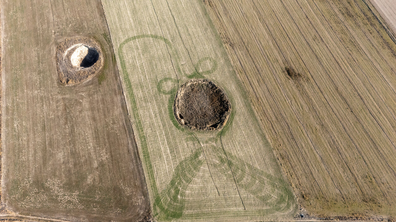 A drone view shows sinkholes formed in the middle of a farmland in Konya province, Turkey, December 19, 2025. REUTERS/Umit Bektas
