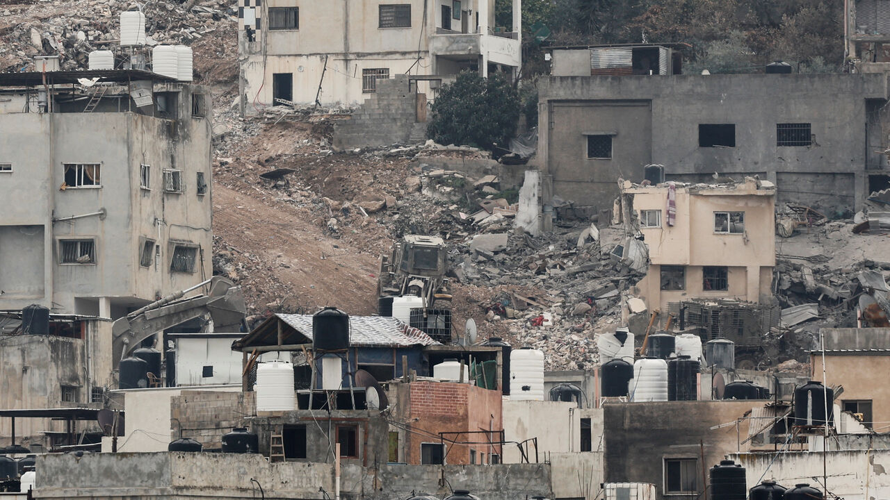 Buildings lie in ruins during an Israeli army operation in Jenin, in the Israeli-occupied West Bank, February 3, 2025. REUTERS/Raneen Sawafta