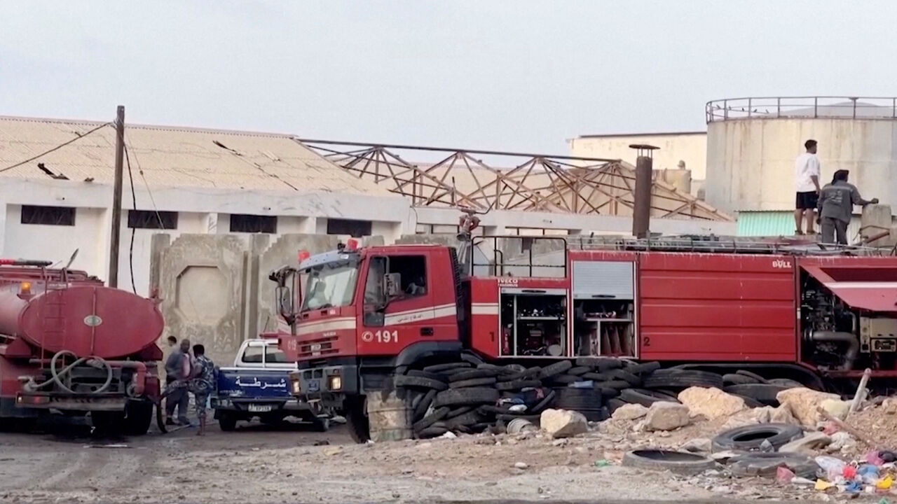 Emergency responders work on the site of a Saudi-led coalition airstrike, which targeted what it described as foreign military support to UAE-backed southern separatists, in Yemen's southern port of Mukalla, in this screengrab from a handout video obtained by Reuters on December 30, 2025.     Aden al-Mustakillah TV/Handout via REUTERS
