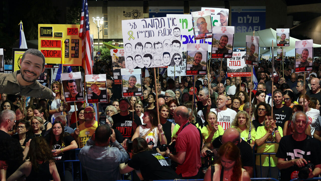 People take part in a demonstration at Hostage Square in the Israeli coastal city of Tel Aviv on Oct. 25, 2025, calling for the release of all the bodies of hostages held in Gaza by the Palestinian militant group Hamas. 