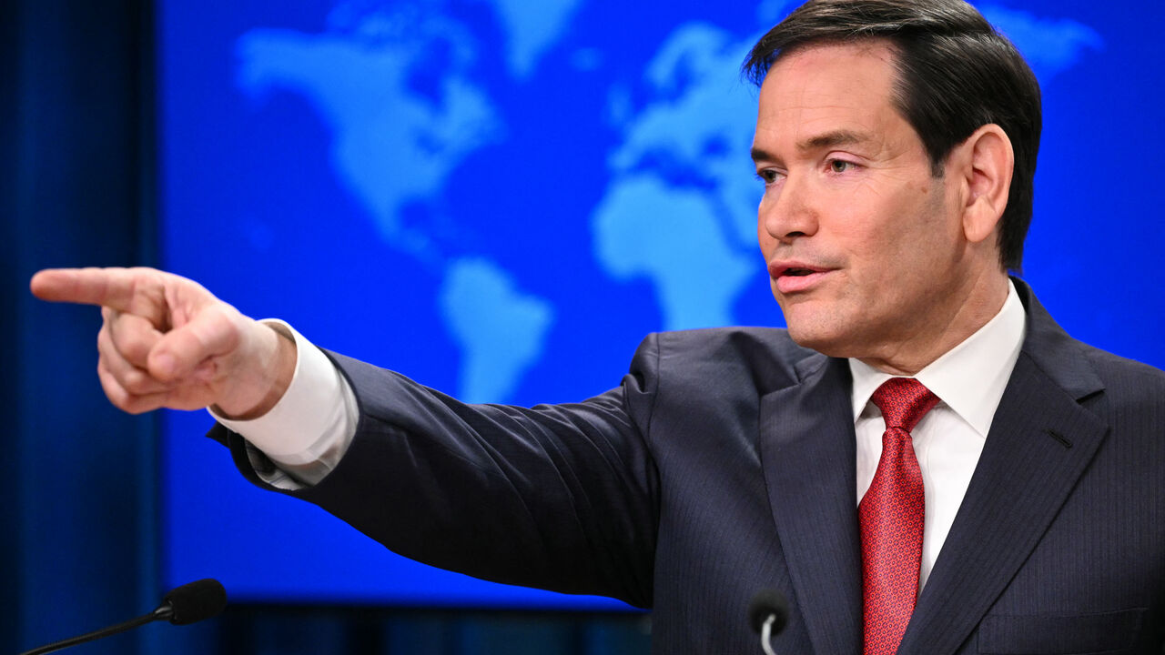 US Secretary of State Marco Rubio gestures as he speaks during an end-of-year press conference in the State Department Press Briefing Room in Washington, DC on December 19, 2025. (Photo by Mandel NGAN / AFP via Getty Images)