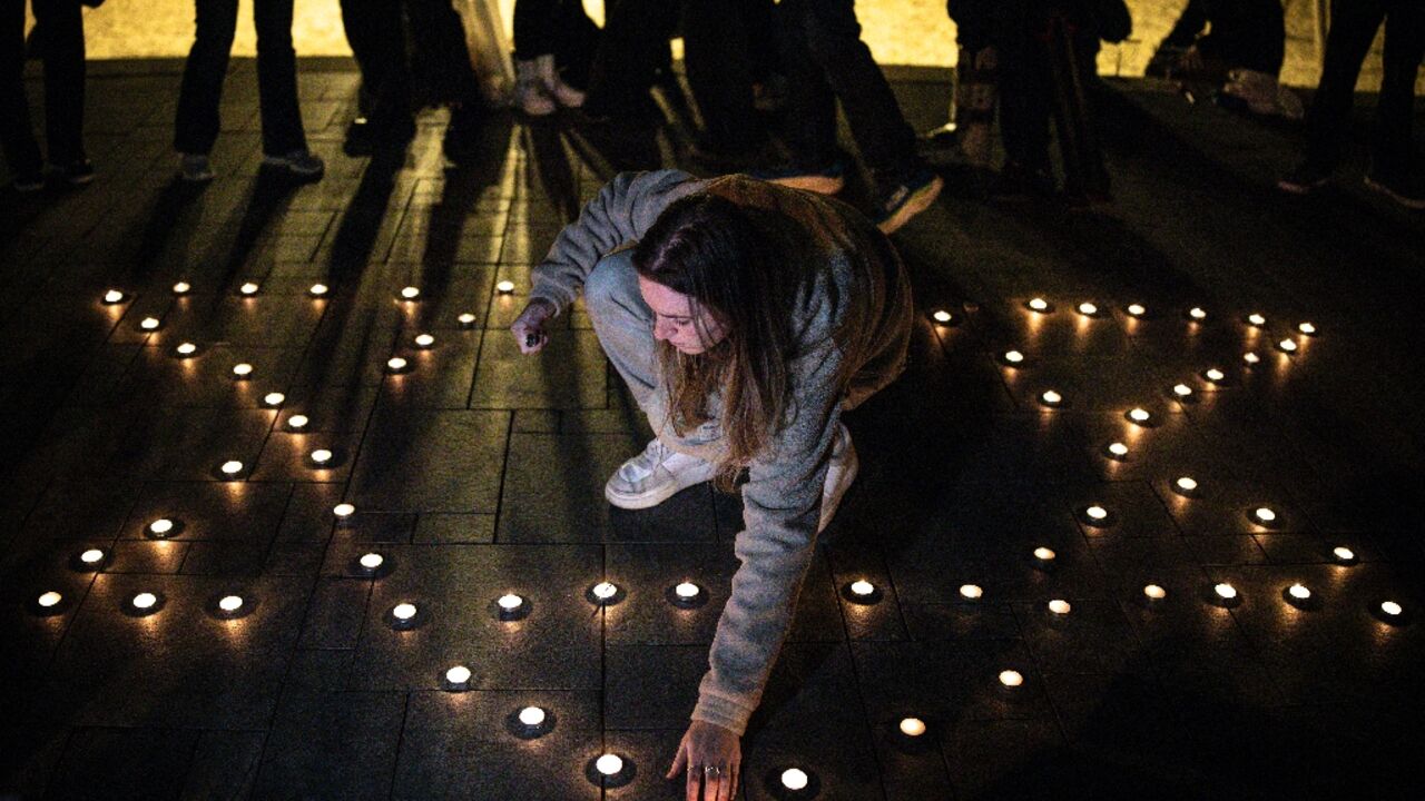 Hours after the shooting in Bondi Beach, a candlelight vigil was held on a beach in Tel Aviv where mourners lit candles