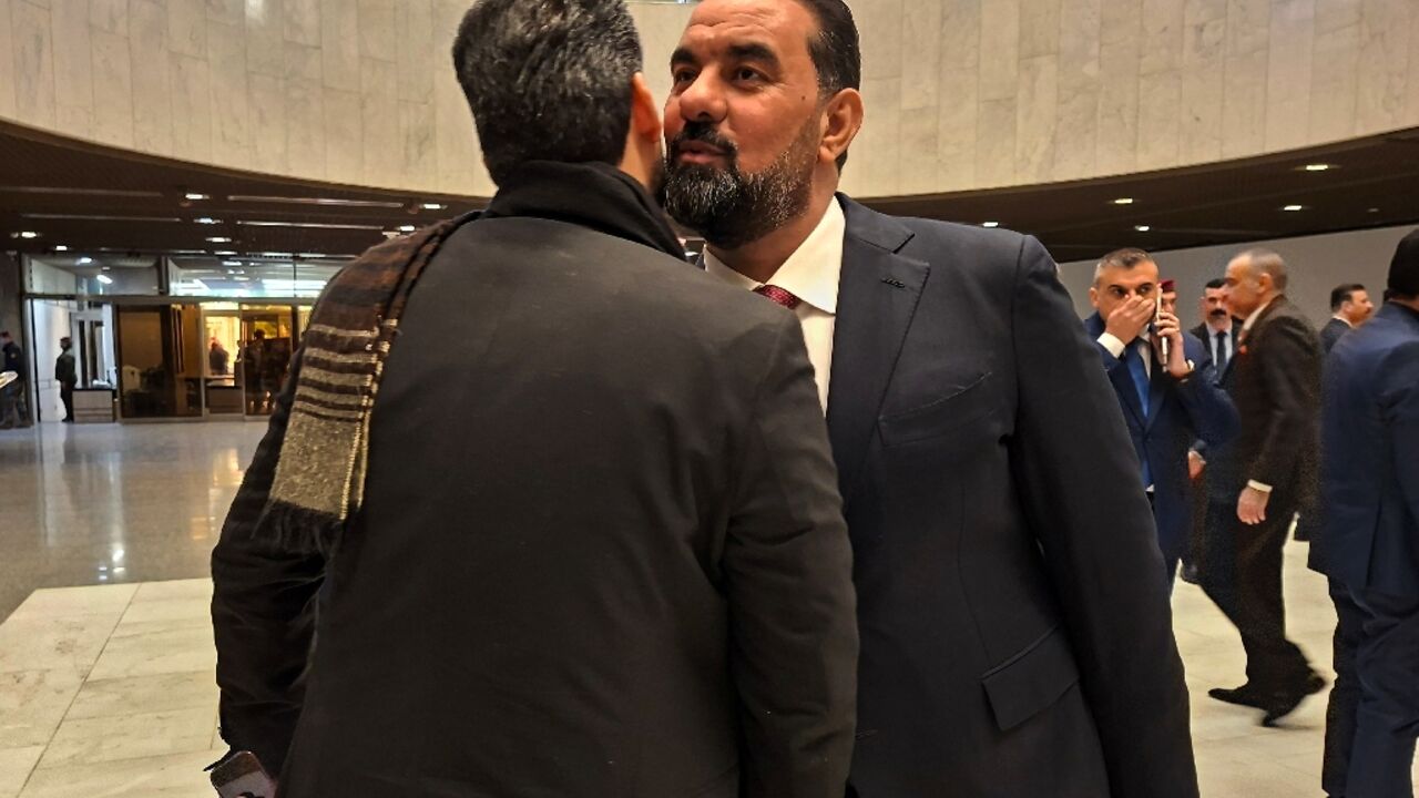 Haibat al-Halbussi arriving at the parliament building ahead of the session in which he was elected speaker