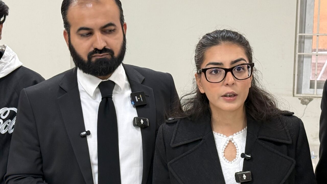 Human rights lawyer Imaan Mazari (R) with her husband and fellow lawyer Hadi Ali Chattha (L) were handed 10-year prison terms for anti-state social media posts