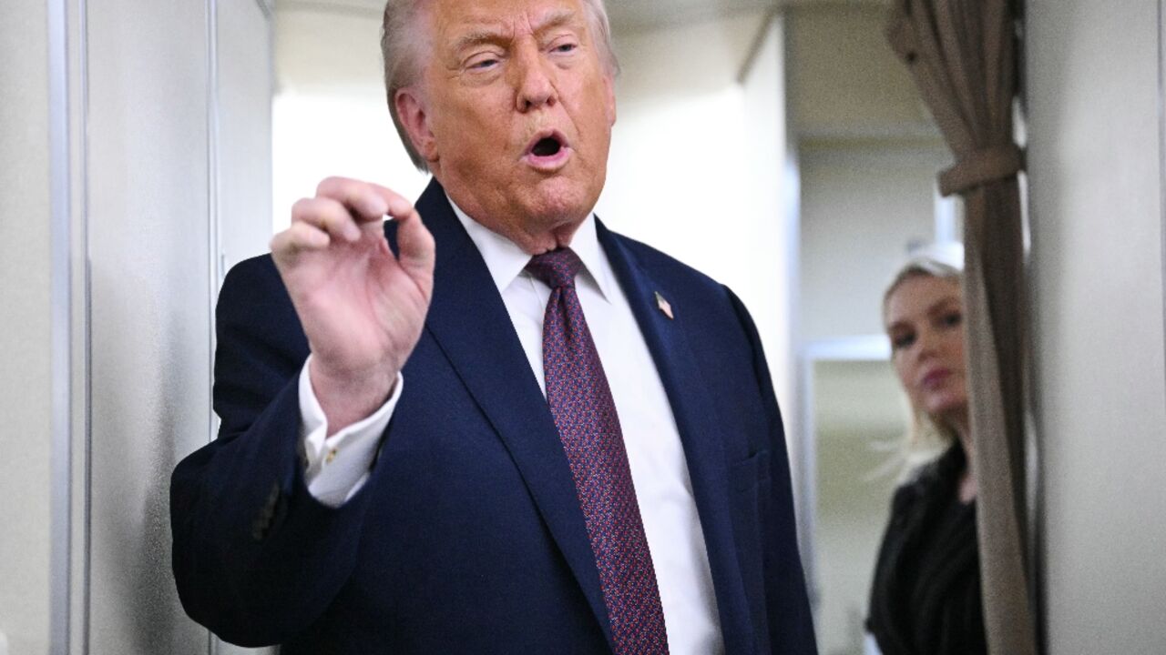 US President Donald Trump speaks to reporters on Air Force One, traveling from Shannon, Ireland en route Joint Base Andrews in Maryland on January 22, 2026