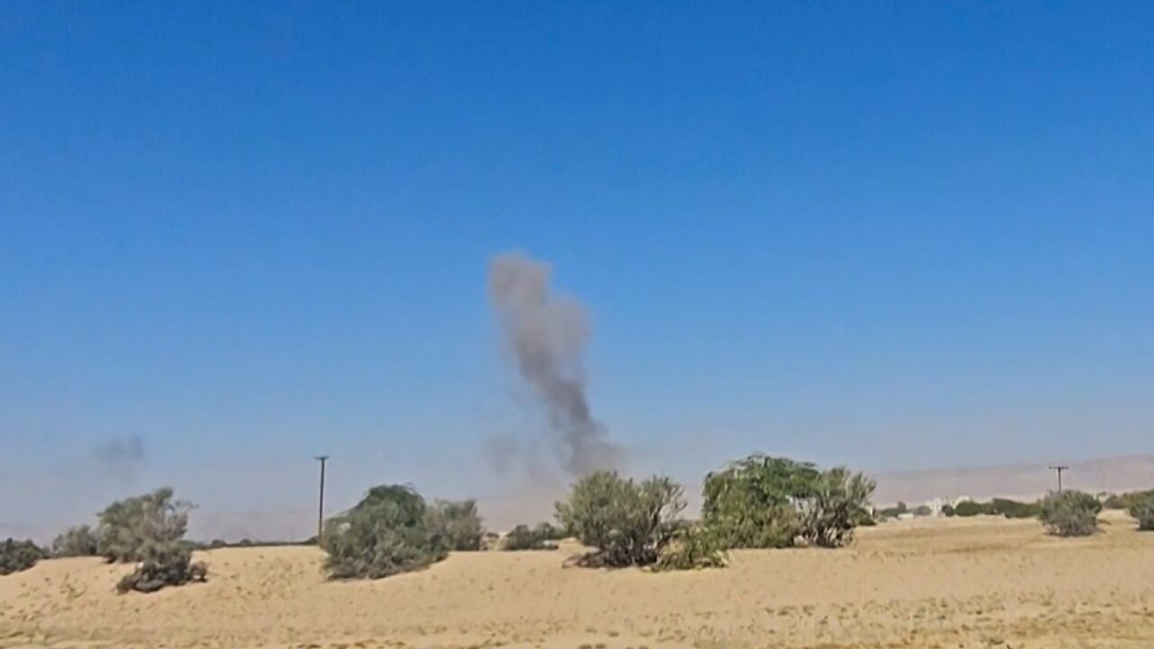 An image grab from AFPTV footage shows smoke billowing after airstrikes that killed seven people in Yemen