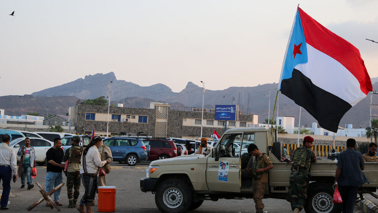 A flag of the UAE-backed separatist Southern Transitional Council (STC) flutters on a military patrol truck, at the site of a rally by STC supporters in Aden, Yemen, January 1, 2026. REUTERS/Fawaz Salman