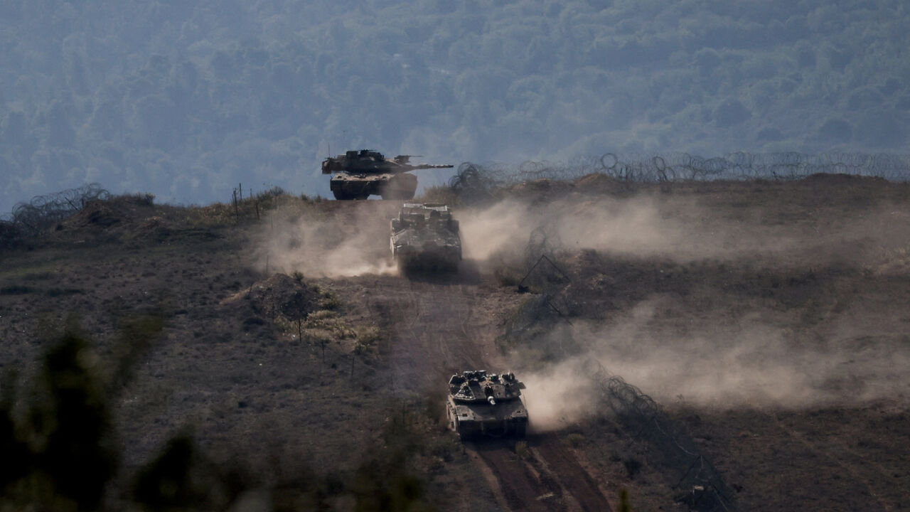FILE PHOTO: Lebanese army members stand on a military vehicle during a Lebanese army media tour, to review the army's operations in the southern Litani sector, in Alma Al-Shaab, near the border with Israel, southern Lebanon, November 28, 2025. REUTERS/Aziz Taher/File Photo