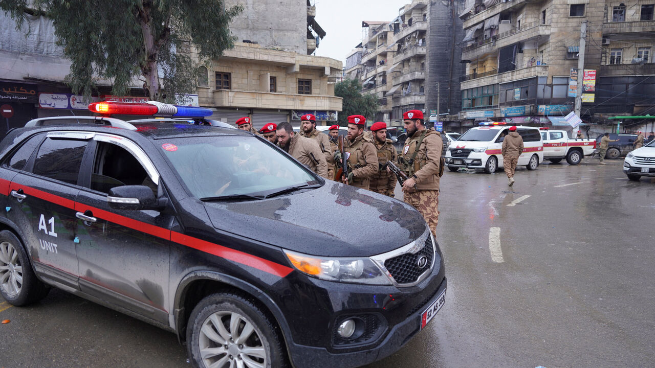 Syrian military police stand guard in Ashrafiyah neighbourhood in Aleppo, Syria, January 9, 2026. REUTERS/Karam al-Masri