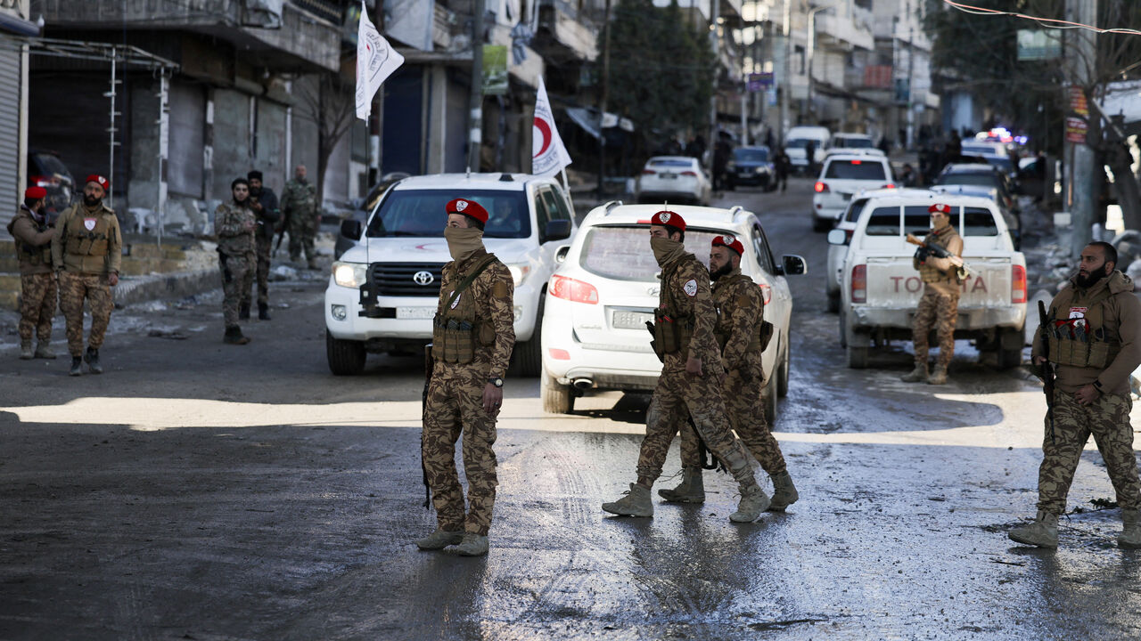 Members of the military police walk following the collapse of an agreement between the Syrian government and the Syrian Democratic Forces (SDF), in Aleppo, Syria, January 10, 2026. REUTERS/Khalil Ashawi