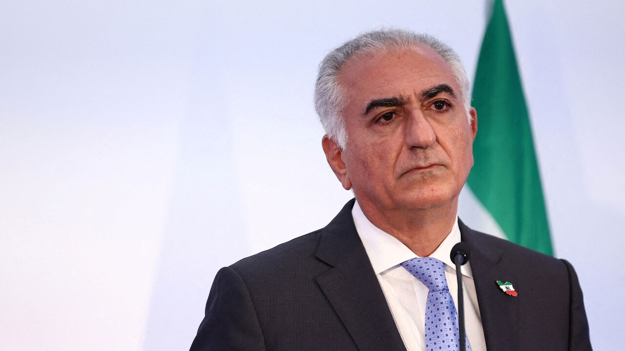 FILE PHOTO: Reza Pahlavi, the exiled son of the last Shah of Iran, attends a press conference about the situation in Iran and the need to support Iranians, in Paris, France, June 23, 2025. REUTERS/Abdul Saboor/File Photo