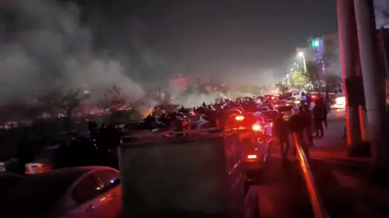 Smoke rises as protesters gather amid evolving anti-government unrest in Mashhad, Razavi Khorasan province, Iran, released on January 10, 2026, in this screen grab obtained from a social media video. SOCIAL MEDIA/via REUTER