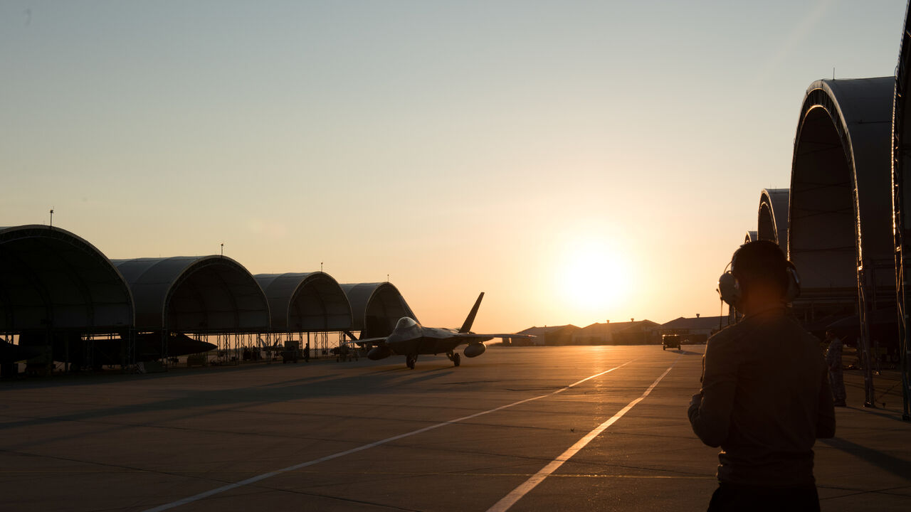An F-22 Raptor from the 1st Fighter Wing, 27th Fighter Squadron taxis for departure deployment to Al Udeid Air Base, Qatar, from Joint Base Langley-Eustis, Virginia, U.S., June 24, 2019. Kaylee Dubois/U.S. Air Force/Handout via REUTERS/File Photo