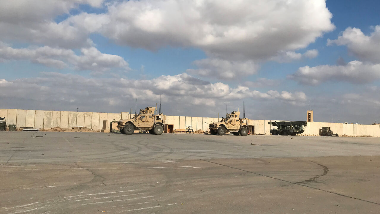 Military vehicles of U.S. soldiers are seen at Ain al-Asad air base in Anbar province, Iraq January 13, 2020. REUTERS/John Davison