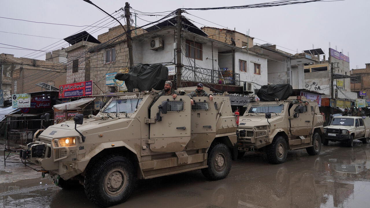 Syrian army military vehicles are deployed inside the city of Tabqa, after the withdrawal of the Syrian Democratic Forces (SDF), in Tabqa, Syria, January 18, 2026. REUTERS/Karam al-Masri