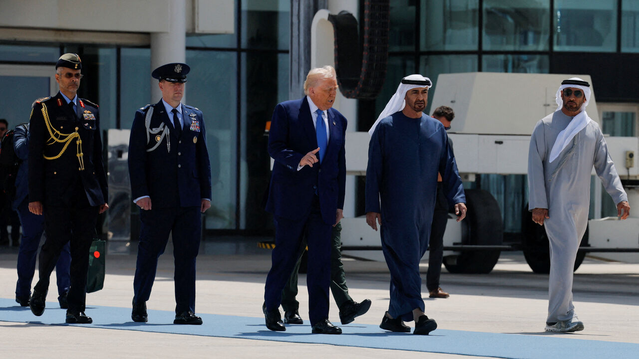 United Arab Emirates President Sheikh Mohamed bin Zayed Al Nahyan accompanies U.S. President Donald Trump as he departs Abu Dhabi, United Arab Emirates, May 16, 2025. REUTERS/Brian Snyder