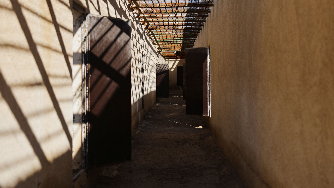 Empty corridor at al-Shaddadi prison, following the withdrawal of the Syrian Democratic Forces and its takeover by the Syrian army, as inmates, members of the Islamic State, fled the facility, in Al-Shaddadi, Al-hasakah, Syria, January 20, 2026. REUTERS/Khalil Ashawi