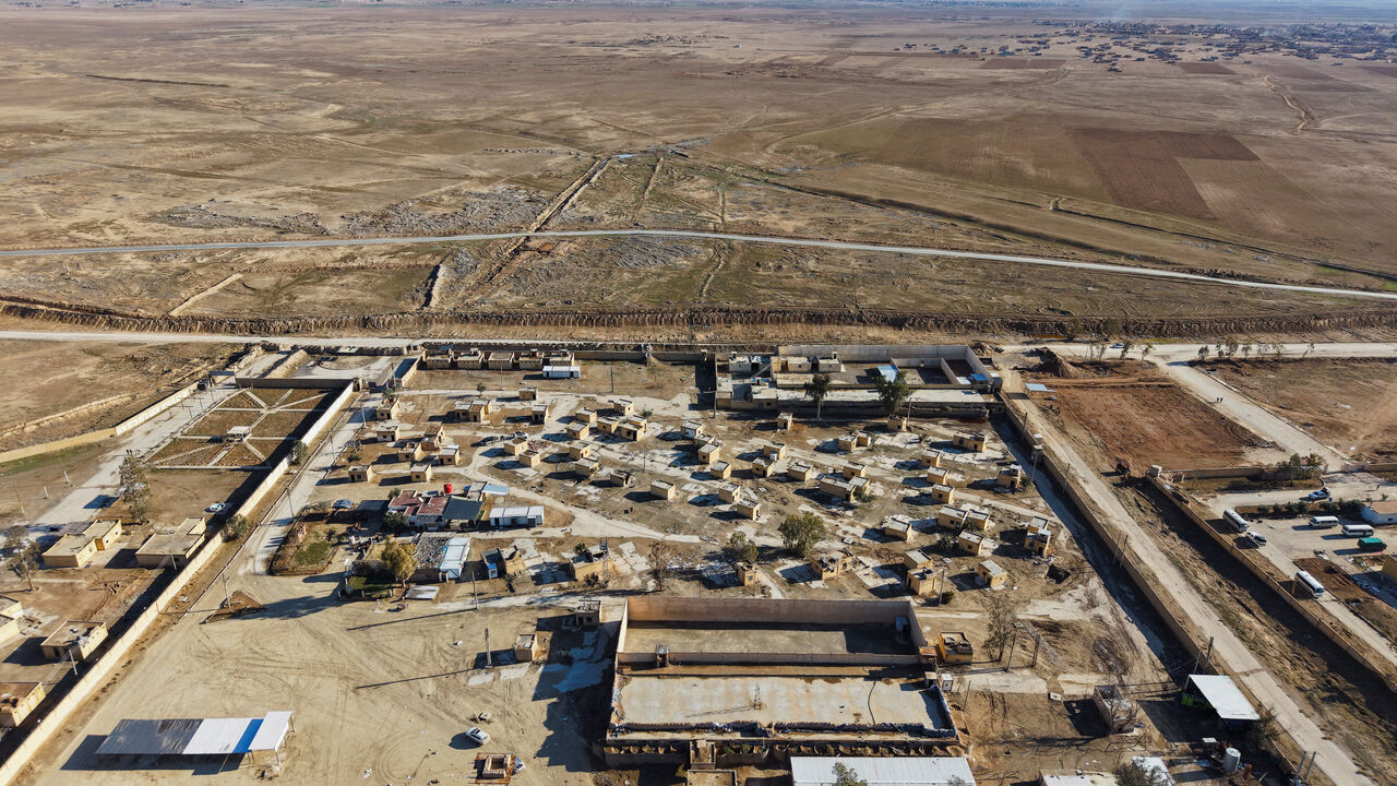A drone view of al-Shaddadi prison following the withdrawal of the Syrian Democratic Forces and its takeover by the Syrian army, as inmates, members of Islamic State, fled the facility, in al-Shaddadi, Syria, January 20, 2026. REUTERS/Khalil Ashawi