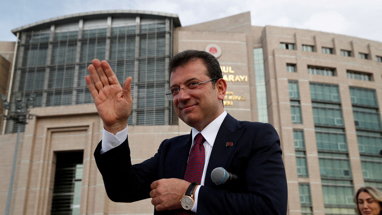 FILE PHOTO: Istanbul Mayor Ekrem Imamoglu, re-elected on Sunday, greets his supporters after receiving mayoral certificate in front of the Caglayan Courthouse in Istanbul, Turkey April 3, 2024. REUTERS/Dilara Senkaya/ File Photo
