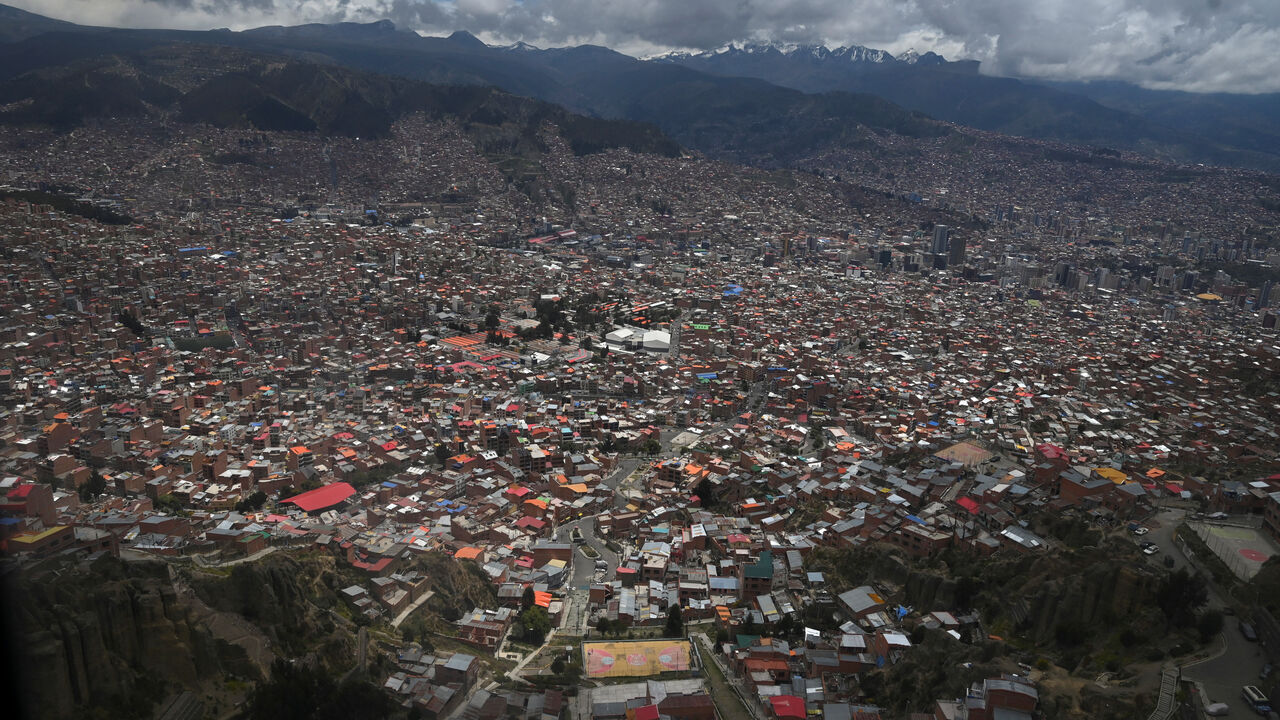 A view, taken through a window, shows the city of La Paz as the government discusses stabilizing the energy sector amid declining production and economic pressures, in El Alto, Bolivia, January 15, 2026. REUTERS/Claudia Morales/File Photo