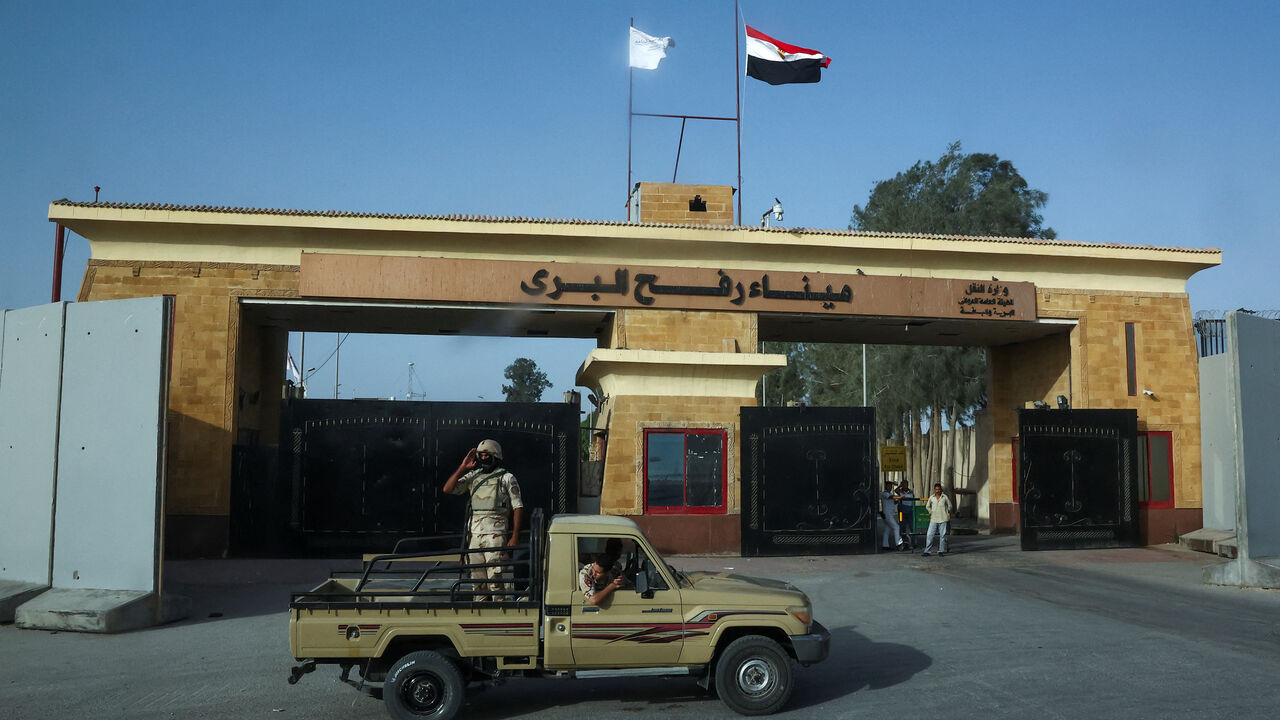 Egyptian soldiers stand guard near the Rafah Crossing at the Egypt-Gaza border, in Rafah, Egypt, July 4, 2024. REUTERS/Amr Alfiky