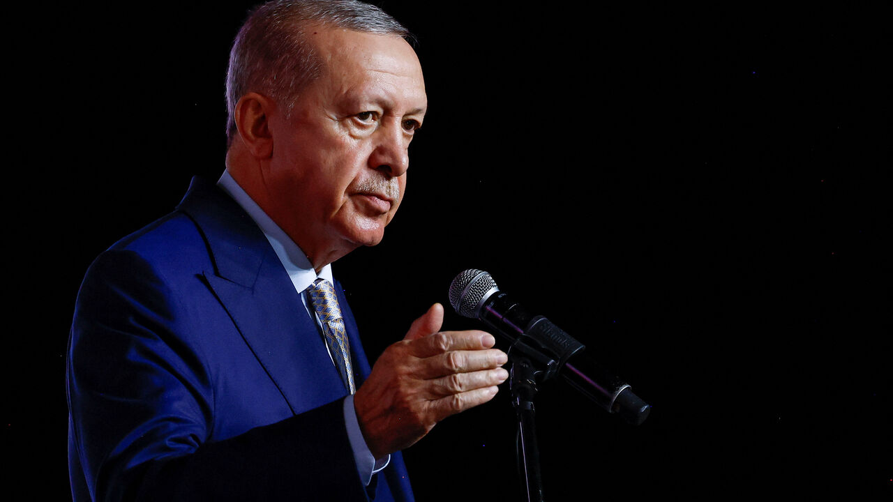 Turkey's President Tayyip Erdogan speaks to the media at the end of the G20 Leaders' Summit in Johannesburg, South Africa, November 23, 2025. REUTERS/Thomas Mukoya