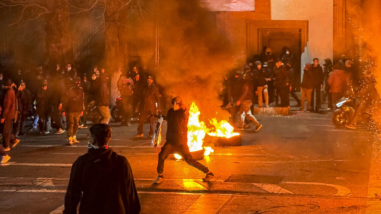 Iranians gather while blocking a street during a protest in Tehran, Iran on Jan. 9, 2026.