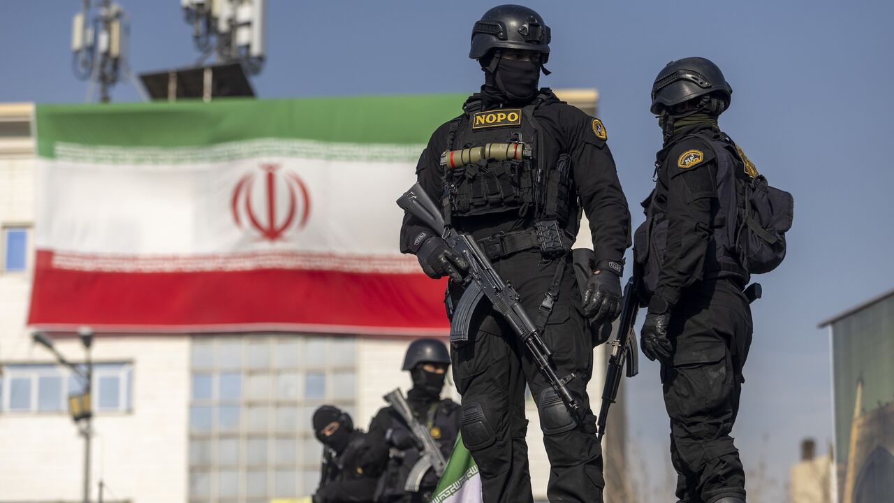 Security forces are seen during a pro-government rally on January 12, 2026, in Tehran, Iran. 