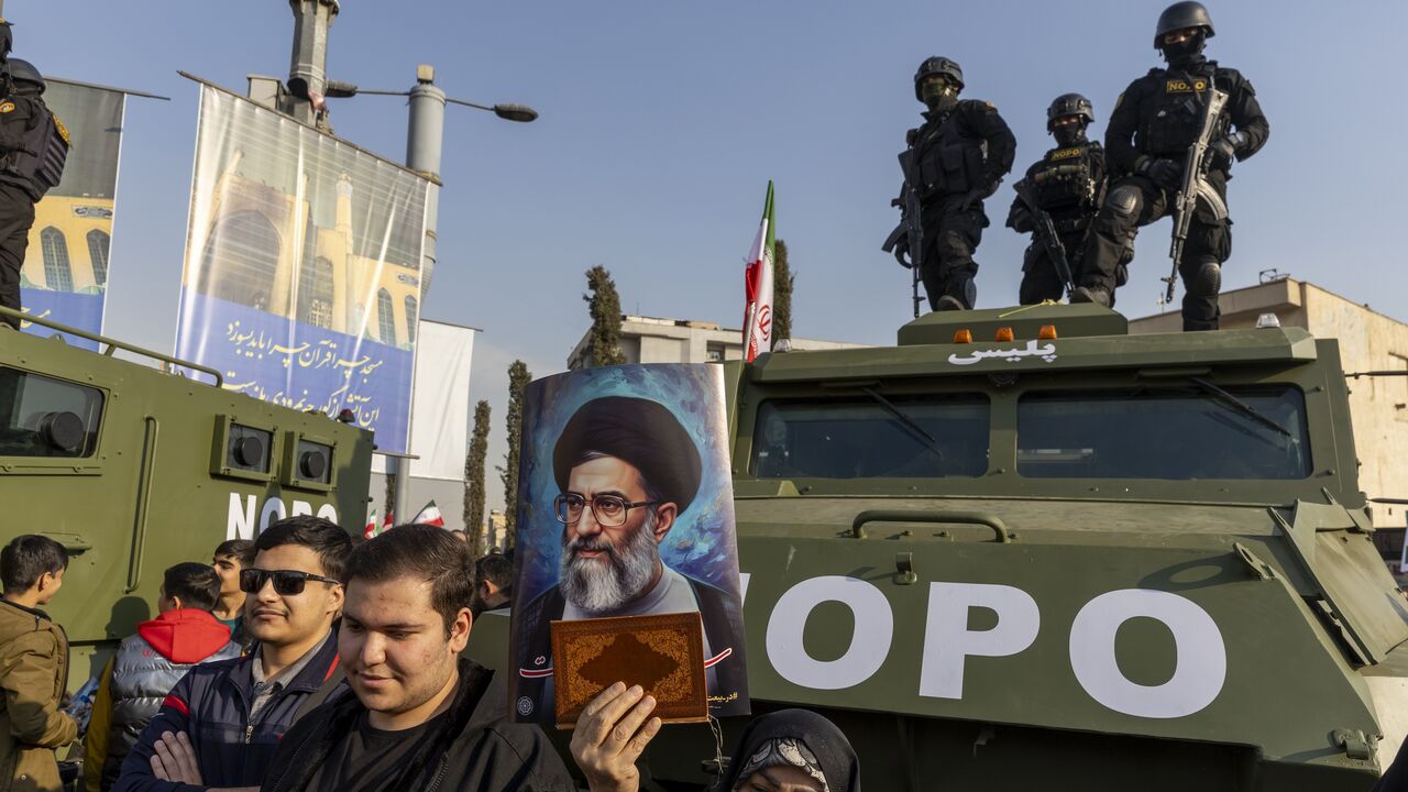 People attend a pro-government rally on Jan. 12, 2026, in Tehran, Iran.
