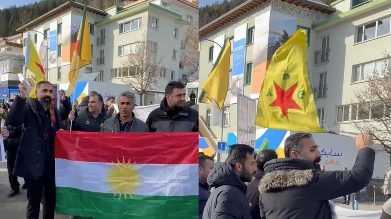 Kurdish protesters gather outside of USA house in Davos, Switzerland at the World Economic Forum with flags of Kurdistan
