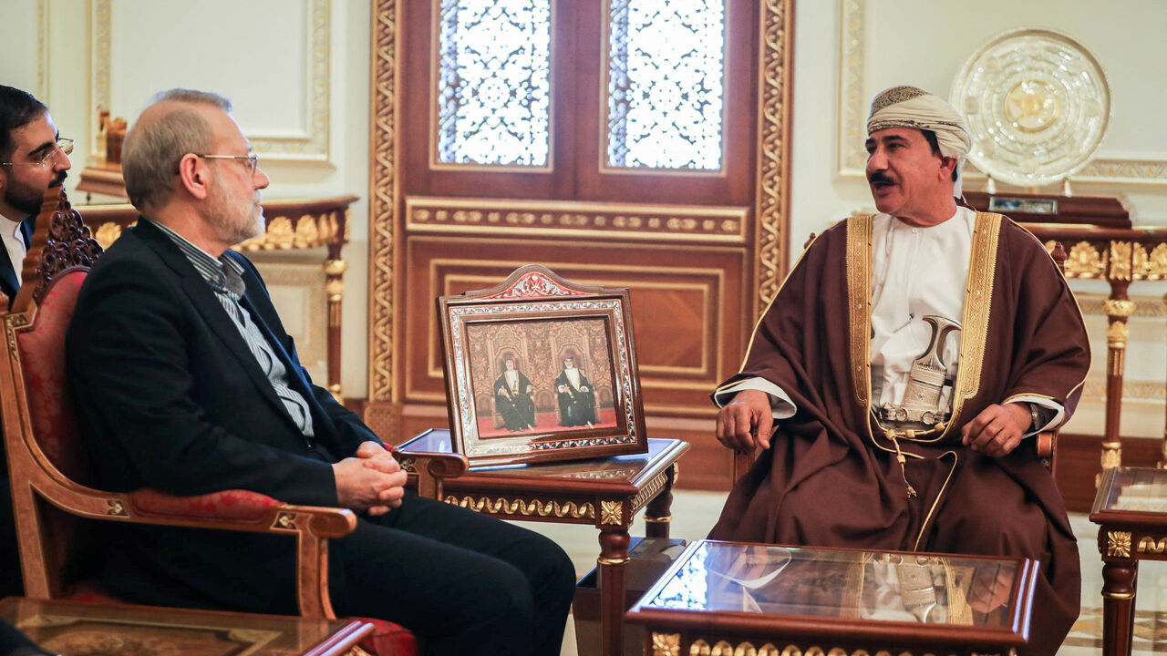 Secretary of the National Security Council, Ali Larijani meets with the Minister of the Royal Office in the Sultanate of Oman, Sultan bin Mohammed al Numani, in Muscat, Oman, February 10, 2026. Iran's National Security Council/WANA (West Asia News Agency)/Handout via REUTERS ATTENTION EDITORS - THIS PICTURE WAS PROVIDED BY A THIRD PARTY.