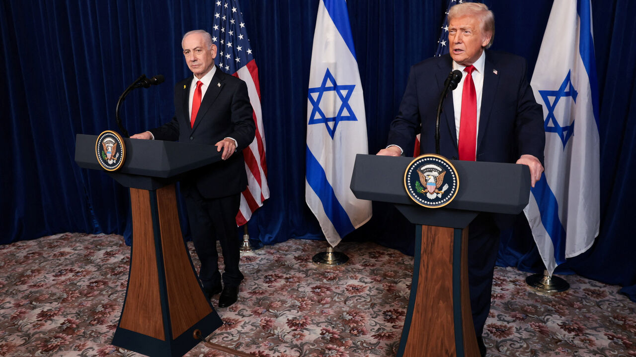 FILE PHOTO: U.S. President Donald Trump and Israeli Prime Minister Benjamin Netanyahu hold a press conference after meeting at Trump’s Mar-a-Lago club in Palm Beach, Florida, U.S., December 29, 2025. REUTERS/Jonathan Ernst/File Photo