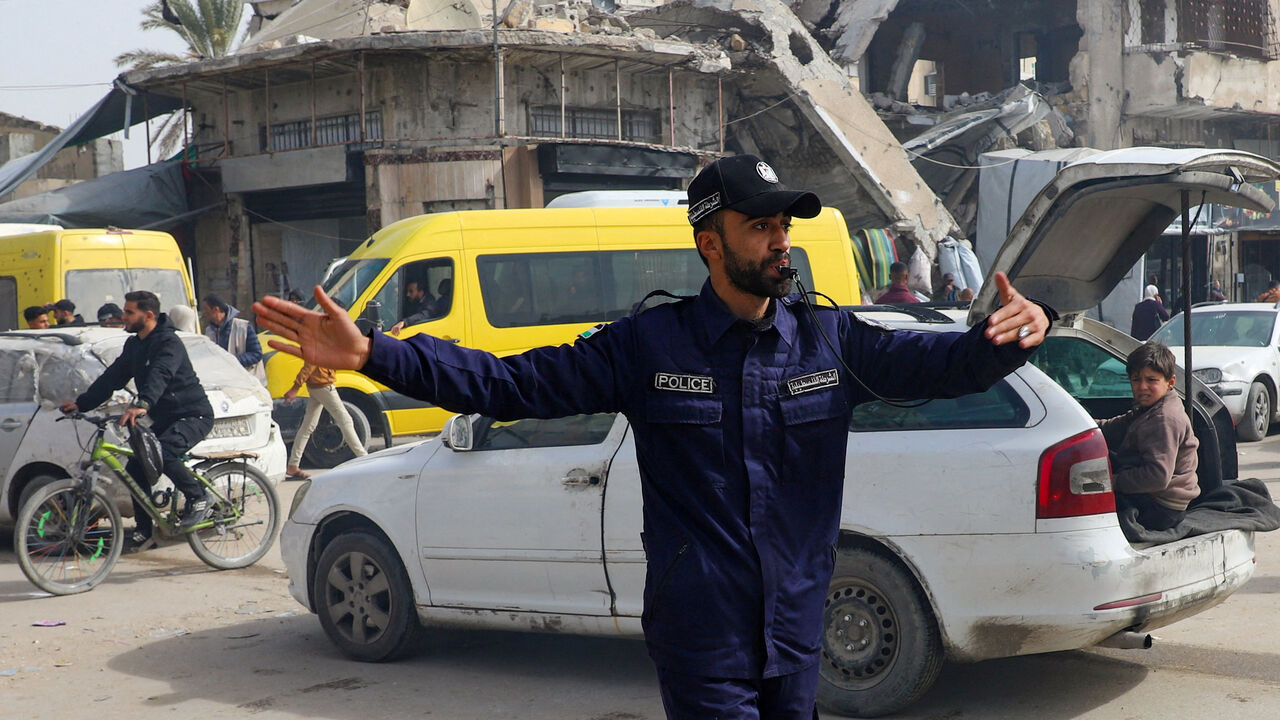 FILE PHOTO: A Hamas Police officer directs traffic in Gaza City, January 28, 2026. REUTERS/Stringer/File Photo