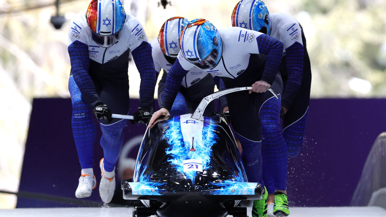 Milano Cortina 2026 Olympics - Bobsleigh - 4-man Heat 1 - Cortina Sliding Centre, Cortina d'Ampezzo, Italy - February 21, 2026. Adam Edelman of Israel, Menachem Chen of Israel, Uri Zisman of Israel, Omer Katz of Israel in action during Heat 1. REUTERS/Athit Perawongmetha