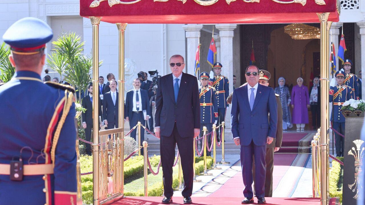 Turkish President Recep Tayyip Erdogan stand with Egyptian President Abdel Fattah al-Sisi in Cairo, Feb. 4, 2026.